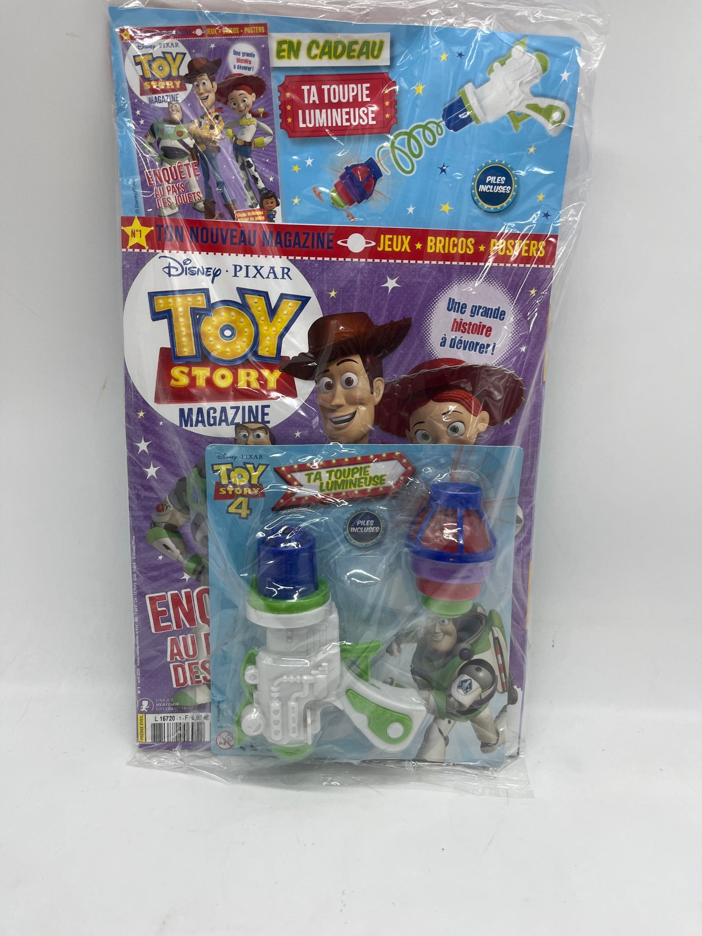Livre d’activité Magazine Disney Princesse TOY STORY avec son pistolet toupie neuf Jeux activité stickers etc ... Prix boutique:6 €99