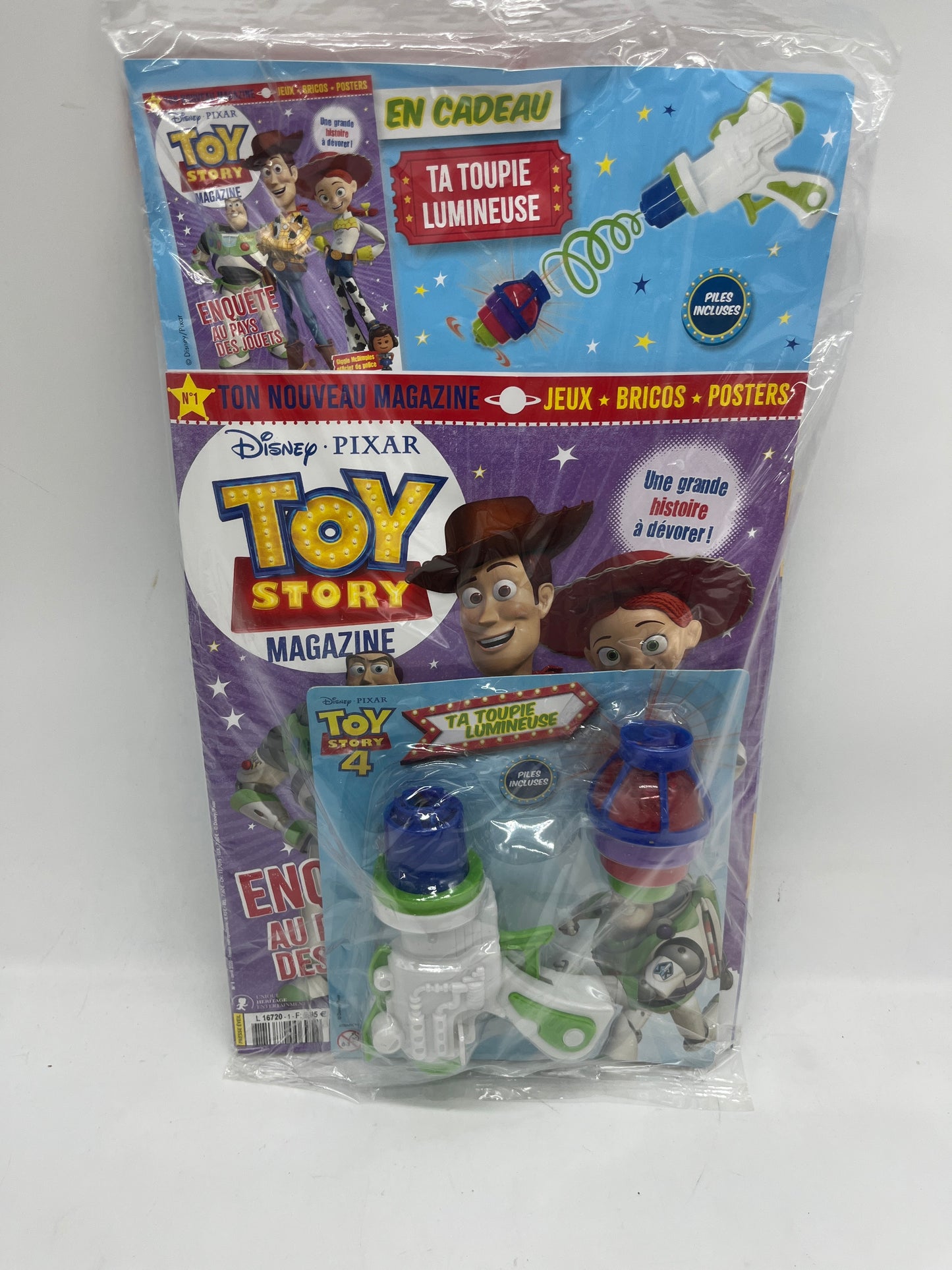 Livre d’activité Magazine Disney Princesse TOY STORY avec son pistolet toupie neuf Jeux activité stickers etc ... Prix boutique:6 €99