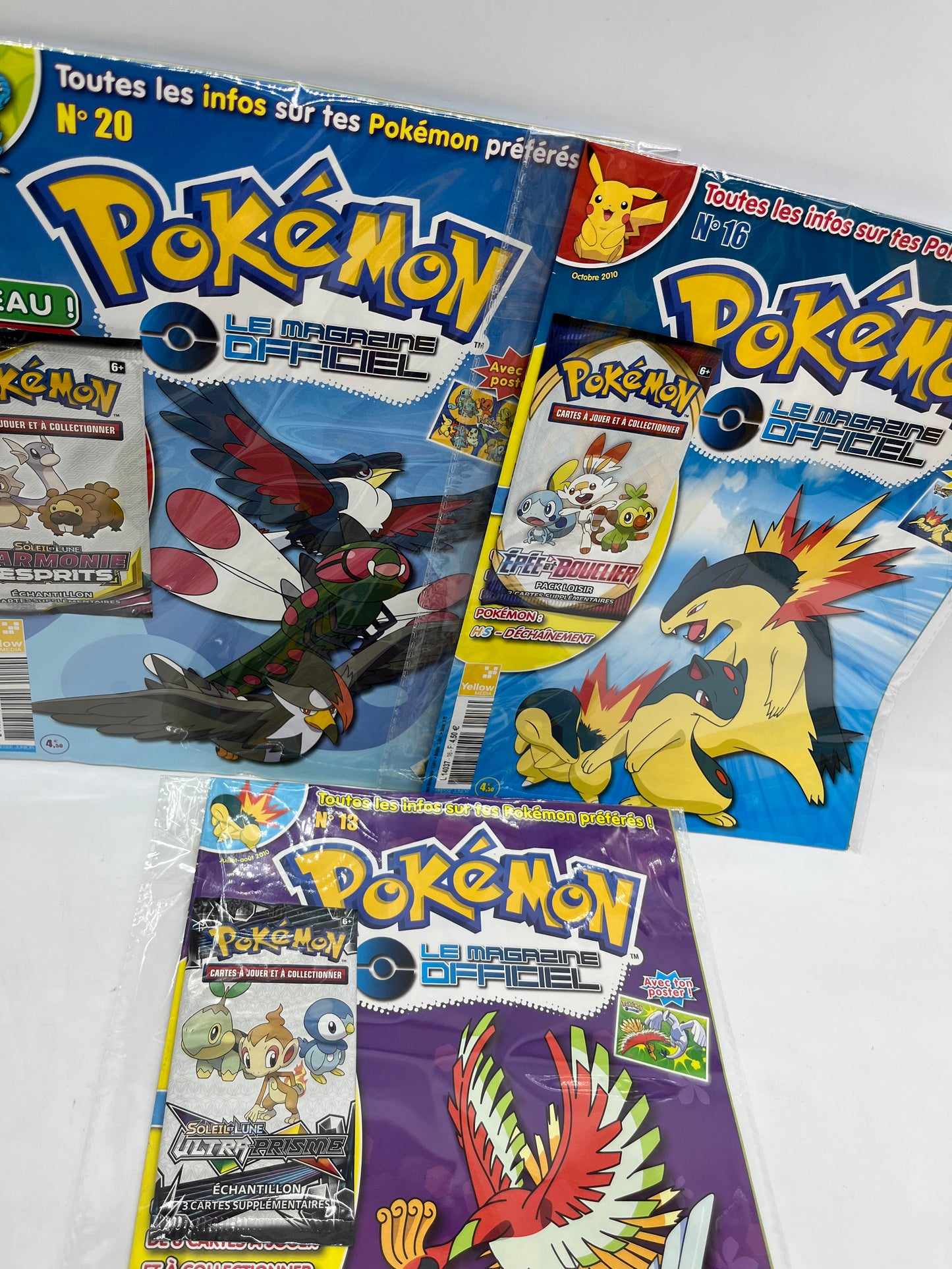 Lot de 3  livres d’activité Magazines Pokémon Le magazine Officiel avec paquets de cartes  Neuf soleil et lune  Harmonie des esprits épée et bouclier Ultra prisme