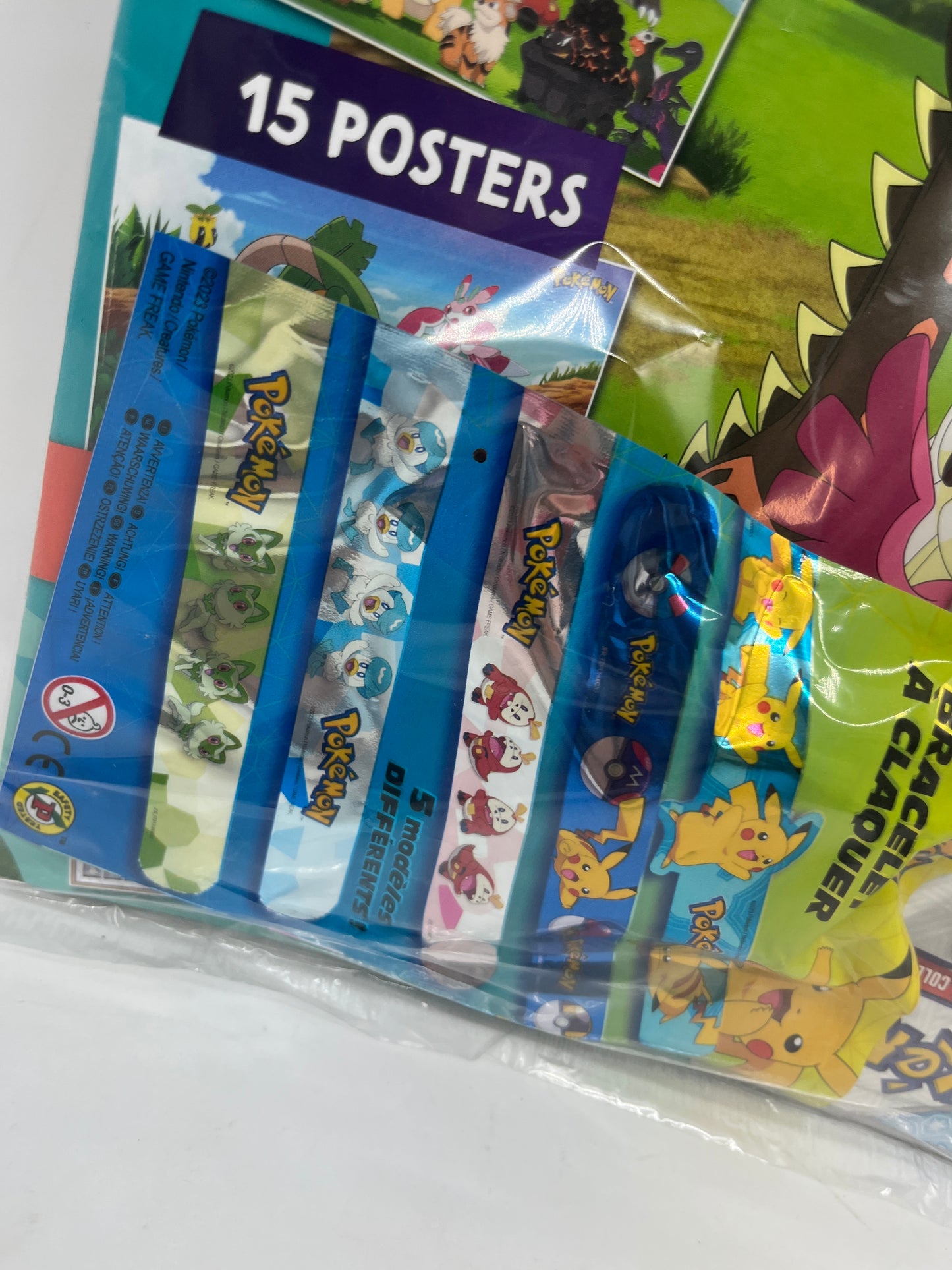 Livre d’activité Magazine Pokémon Hors series avec son bracelet Pokemon clap et son paquet de carte neuf
