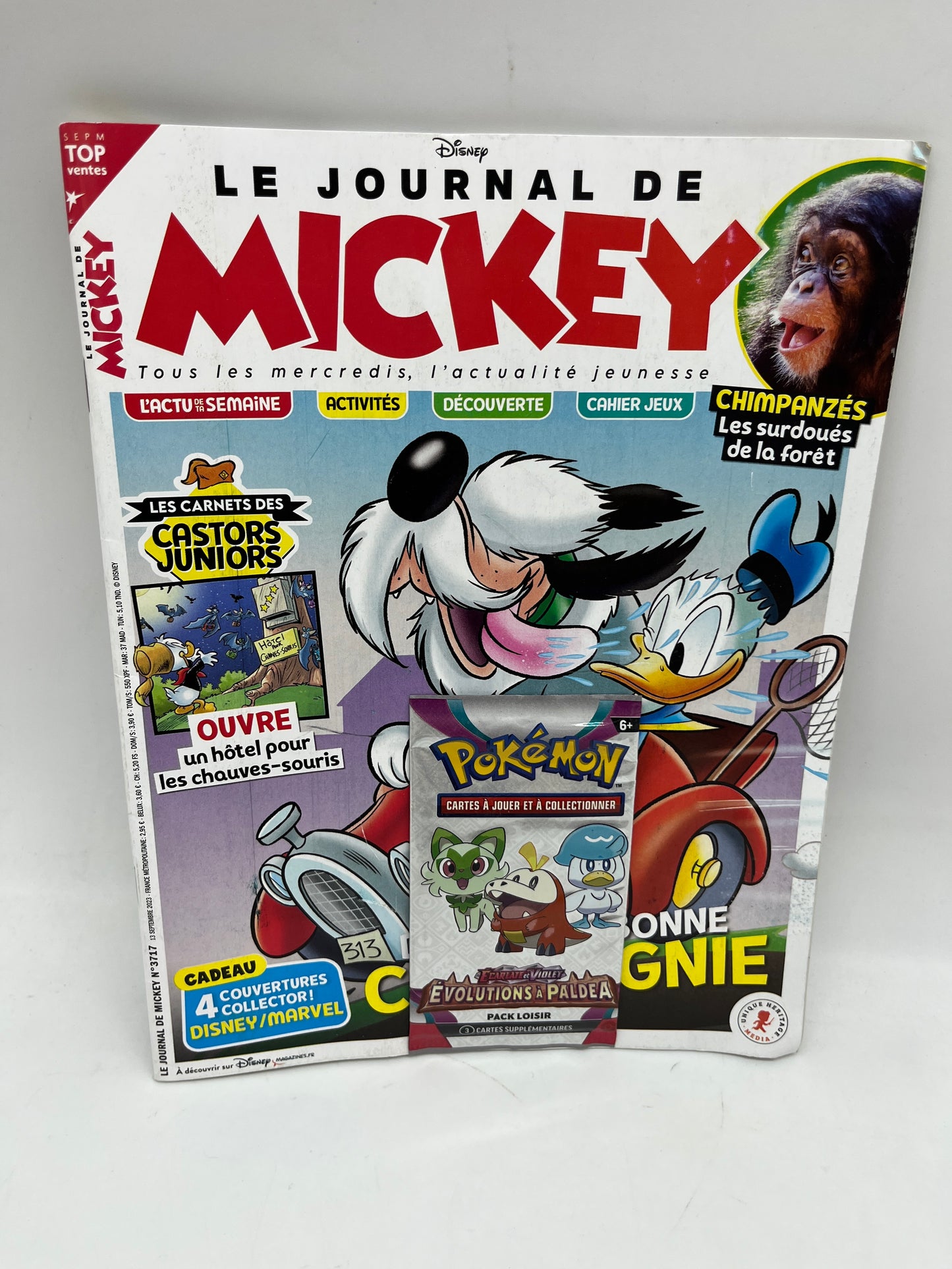 Livre d’activité Magazine le nouveau  journal de mickey avec ses BD et son booster Pokemon évolutions et Paldea Neuf