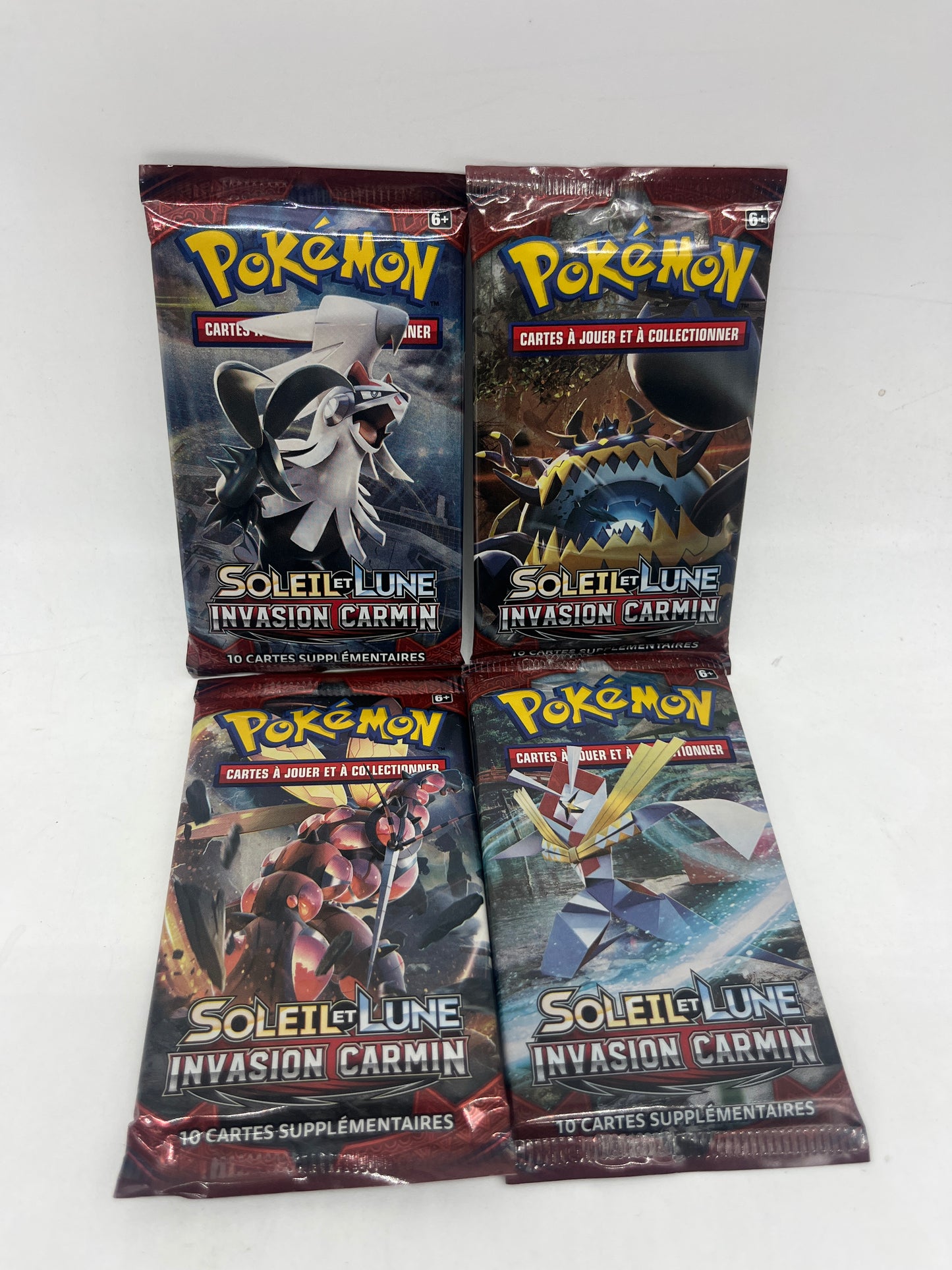 Lot de 4 paquets carte Boosters Pokémon Artset Série  SL4 soleil et Lune invasion carmin