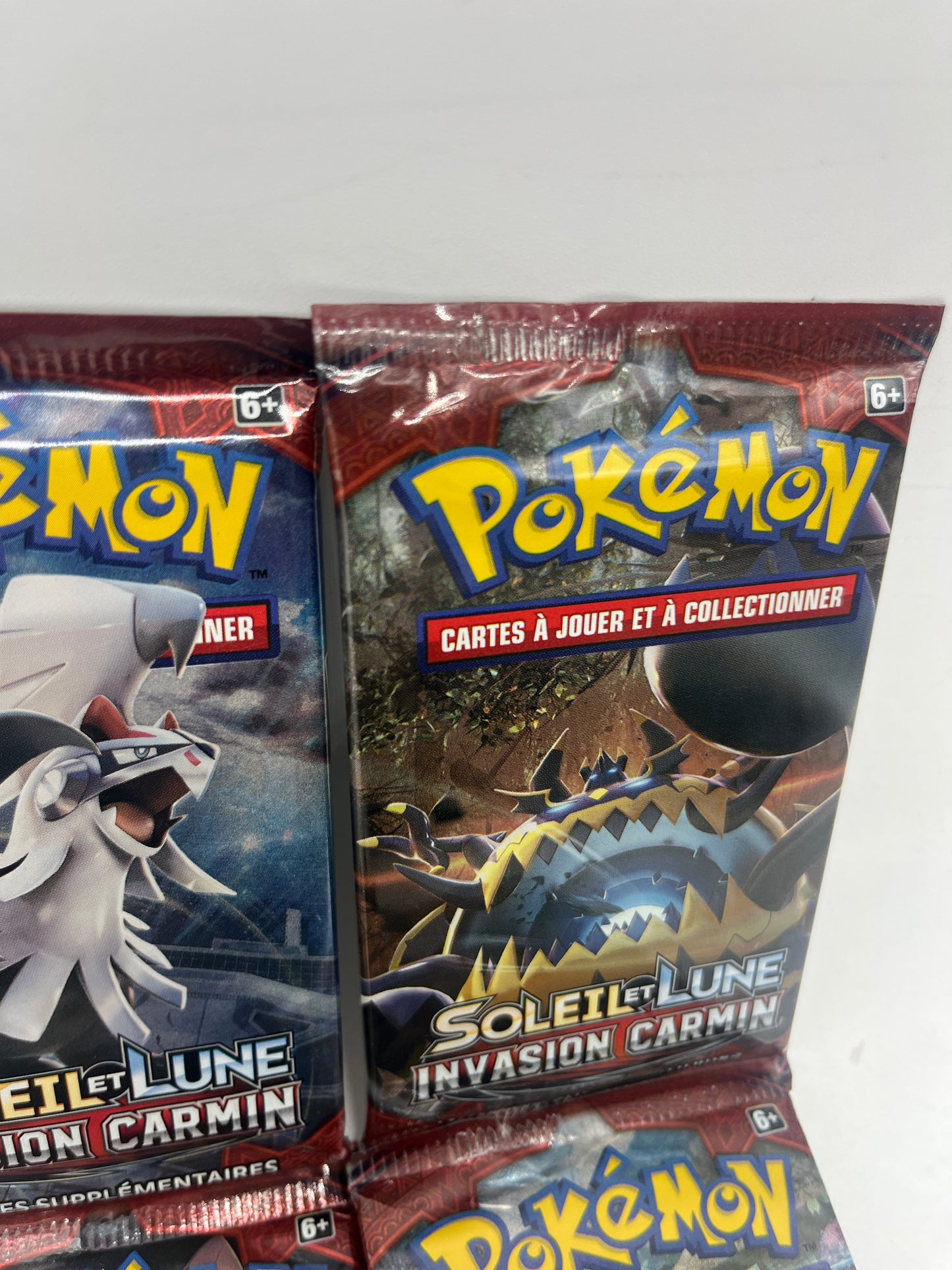 Lot de 4 paquets carte Boosters Pokémon Artset Série  SL4 soleil et Lune invasion carmin