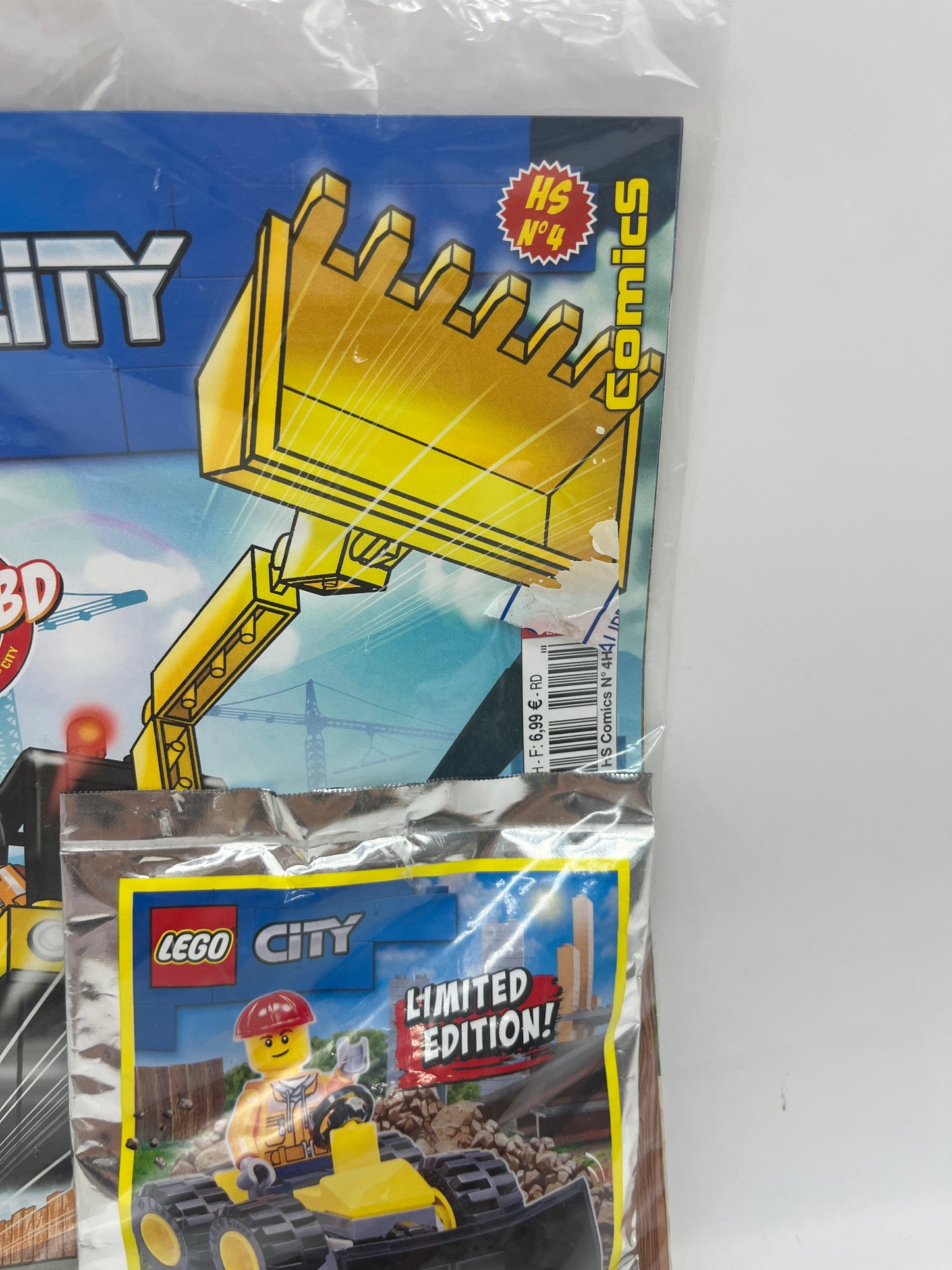 livre d’activité Magazine Lego city  avec sa mini figurine et son tractopelle  Neuf !