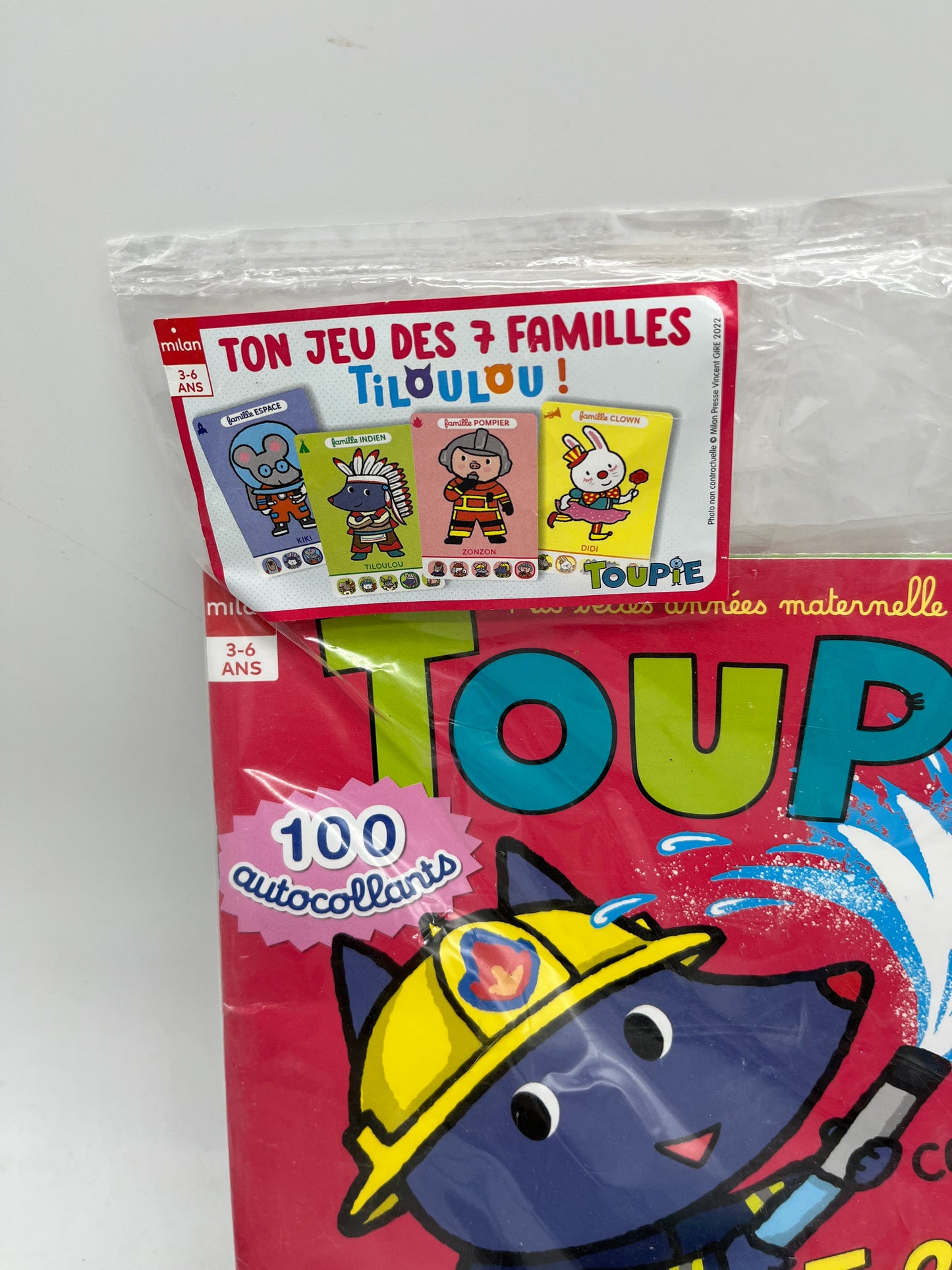 livre d’activité Magazine  Toupie avec son jeu de 7 familles Neuf !